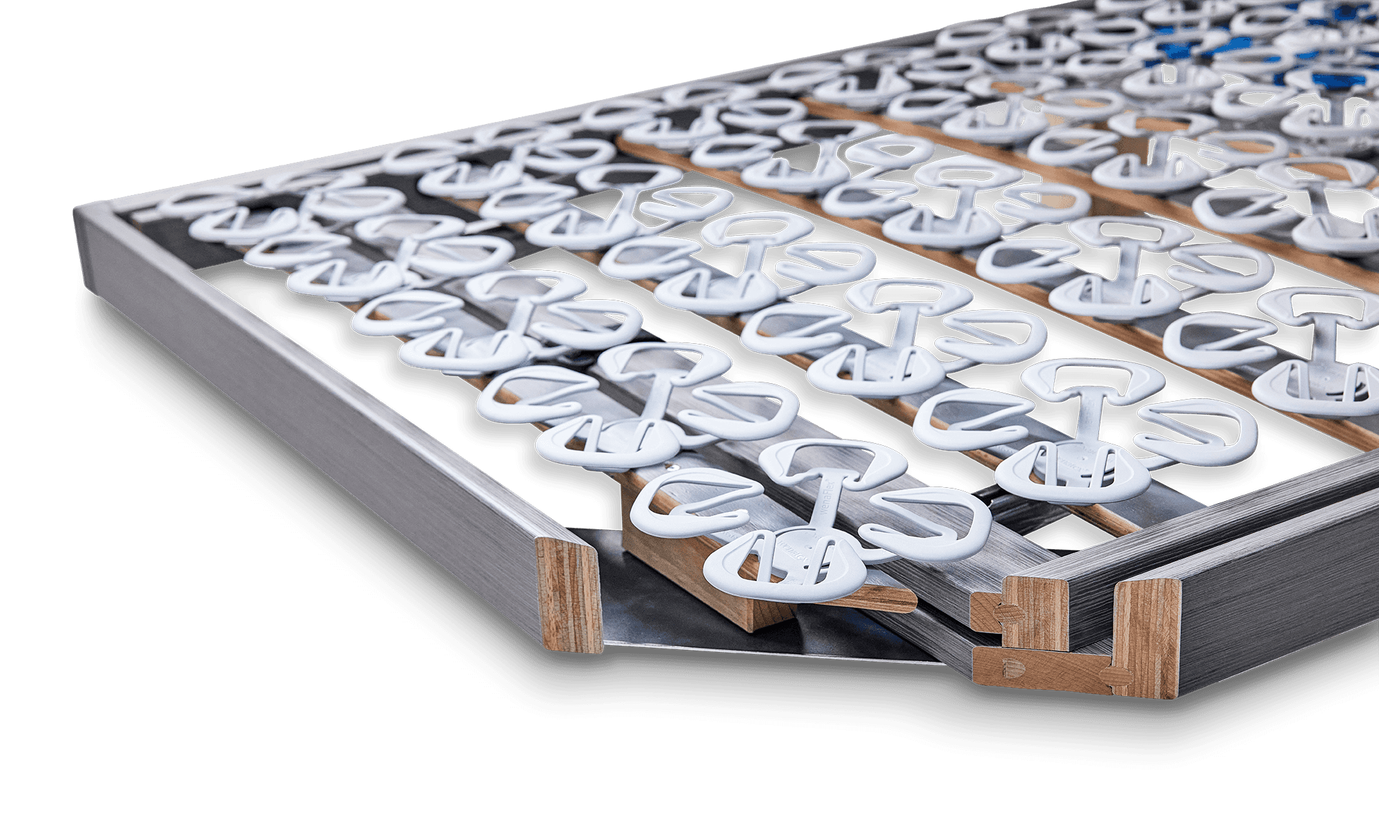 Close-up of a slatted bed base with flexible spring slats from Wenatex.